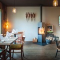 Studio/Spaces: Restaurant mit Kamin