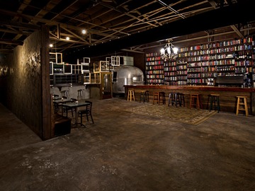 Studio/Spaces: Speakeasy Bar and Lounge with Bookshelf Wall