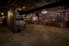 Studio/Spaces: Speakeasy Bar and Lounge with Bookshelf Wall
