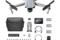 Rentals: DJI Mavic Air 2 Fly More + Drone Pilot